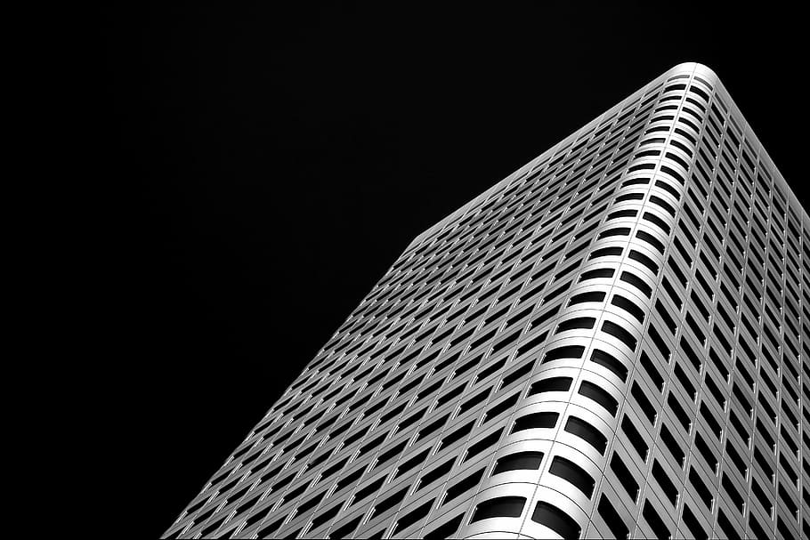 low-angle photography of white concrete building, architecture