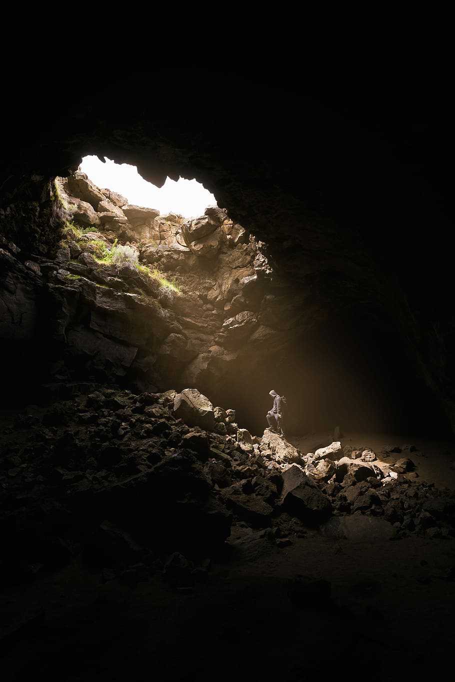 photo of brown cave, nature, person, light, darkness, rock HD wallpaper