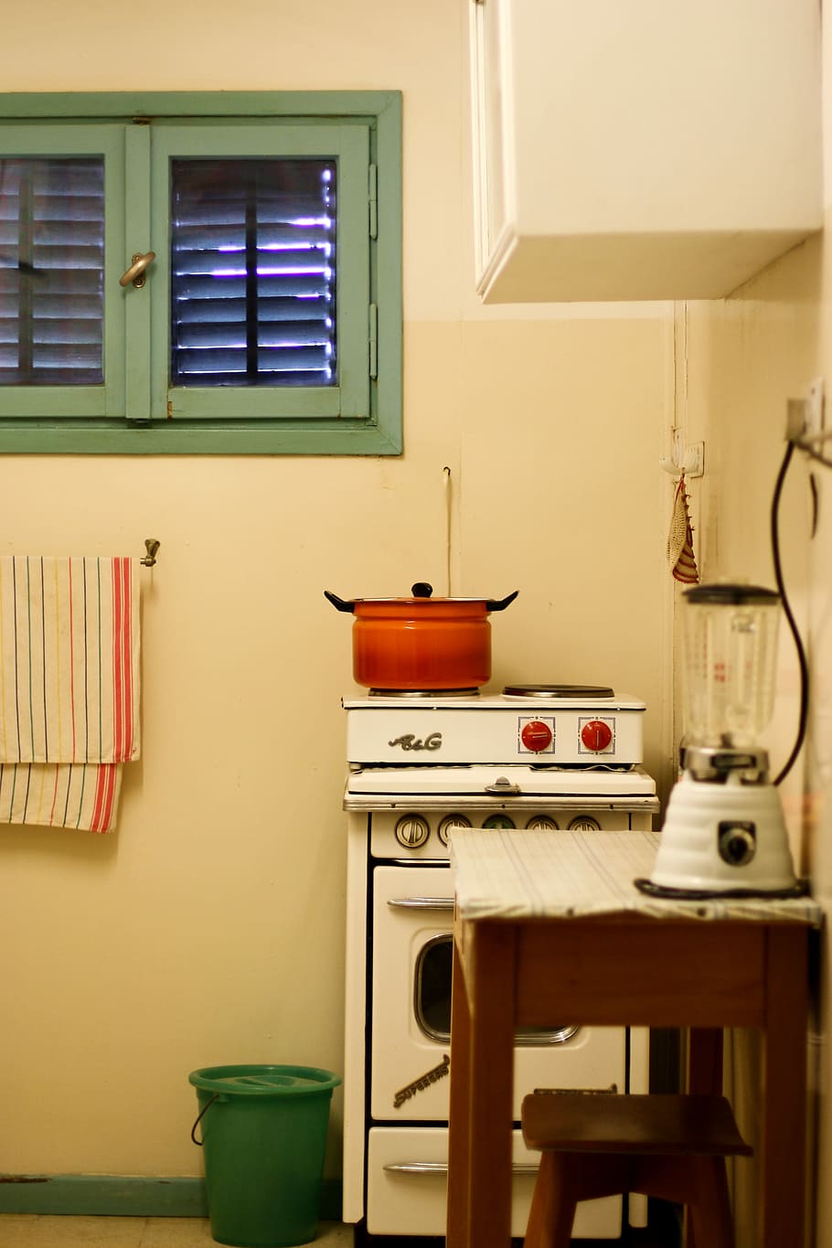 steel casserole on stove, orange cooking pot on white gas range HD wallpaper