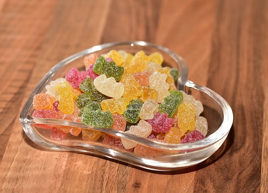 gummy bear candies in glass heart bowl, fruit jelly, sour, sugar