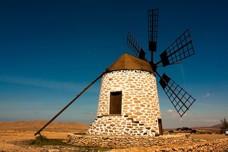 photo of white and brown concrete windmill under blue sky at daytime, HD wallpaper