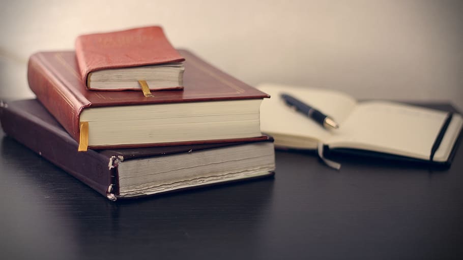 three assorted books on table, notepad, pen, education, notebook HD wallpaper
