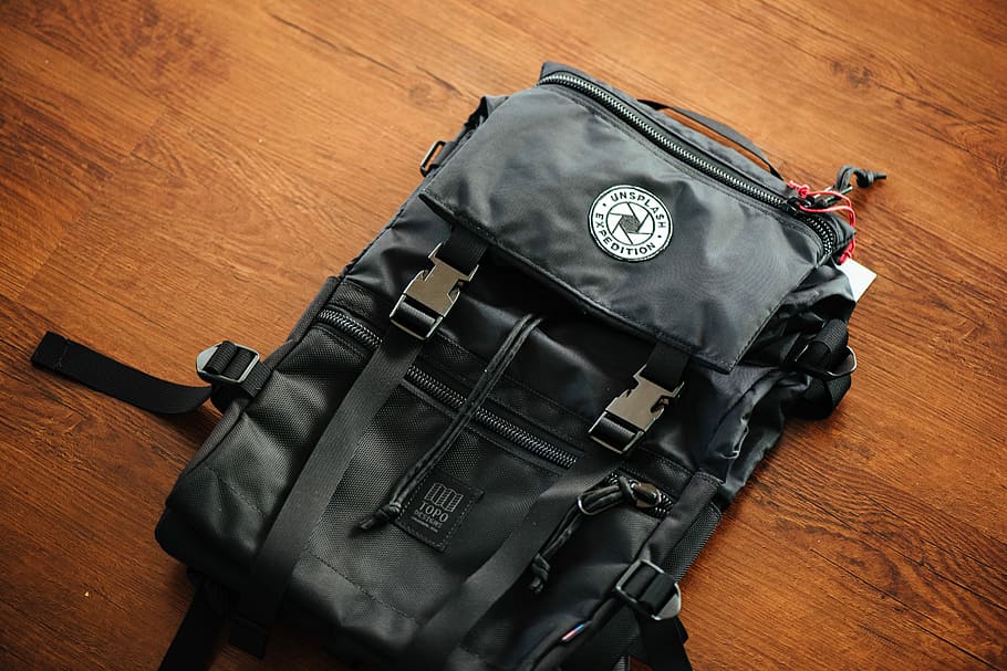 black backpack on wooden deck, black backpack on floor, bag, table, HD wallpaper