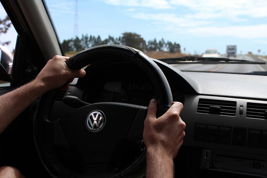 person driving Volkswagen vehicle at daytime, Hand, Drive, Steering Wheel HD wallpaper