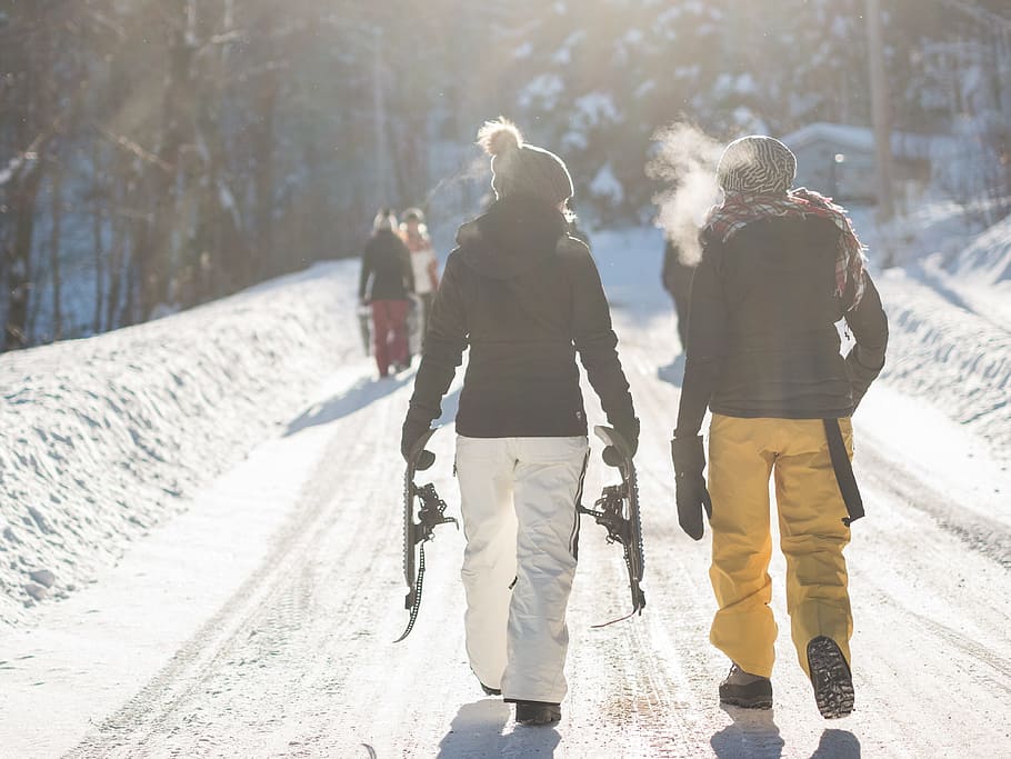 woman wearing black coat beside man during daytime, snow, path HD wallpaper