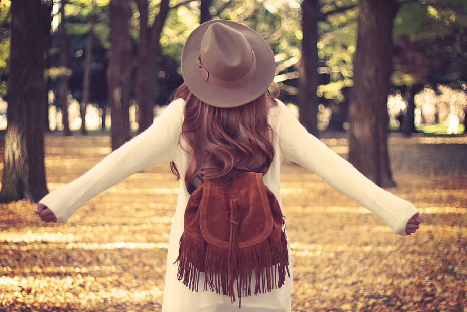 woman wearing brown sun hat and white sweater dress, women, outdoors