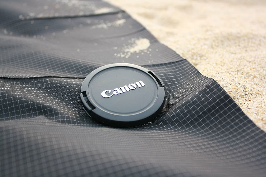 mat, sand, grid, cannon, canon, lens, cover, lid, technology HD wallpaper
