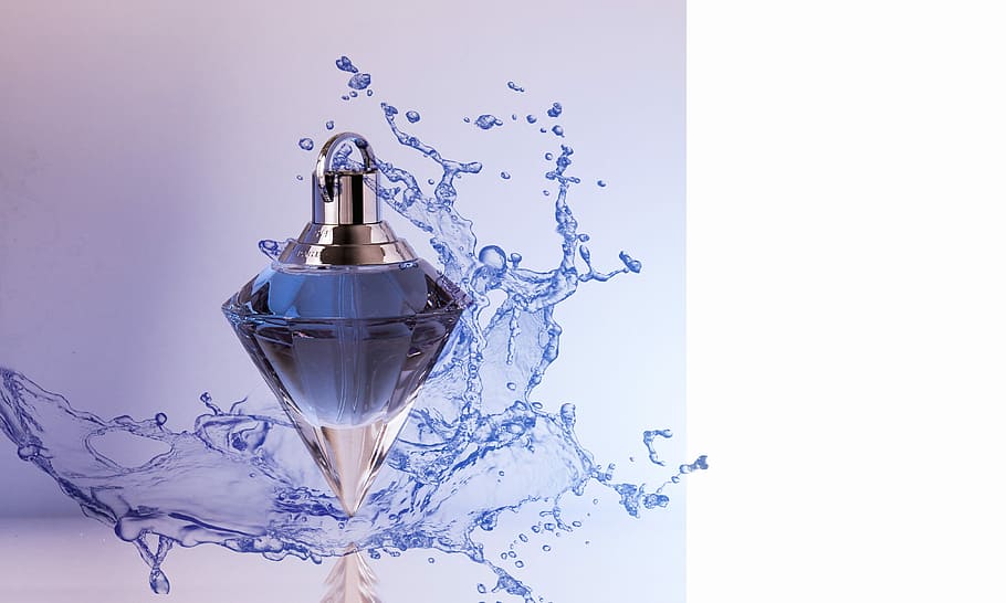 time lapse photography of fragrance bottle with water dew wallpaper