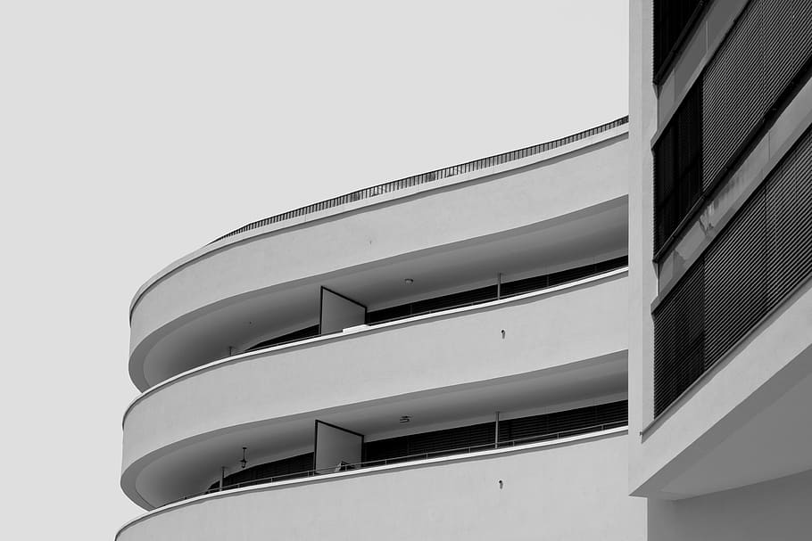 architectural photography of white curved concrete building HD wallpaper