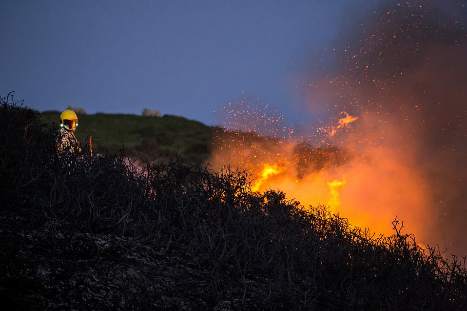 dried twigs on fire, grass near fire at night time, volcano, flame HD wallpaper