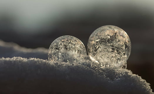 three round ornaments on snow closeup photo, soap bubbles, cold HD wallpaper