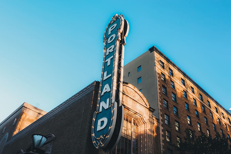 low angle photography of Portland LED signage, low-angle photogrpahy of Portland signage HD wallpaper
