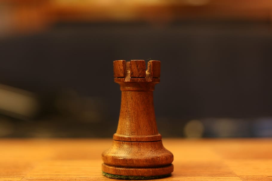 brown chess piece on brown wood, rook, thinking, game, board