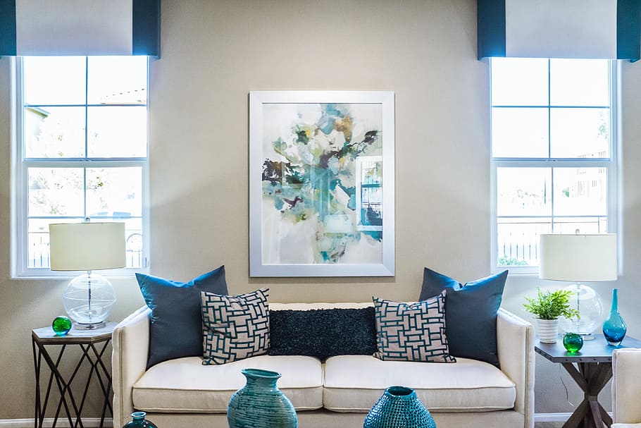 couch near painting, white suede 2-seat sofa with four throw pillows HD wallpaper