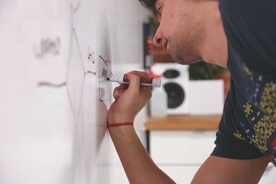 man holding marker, whiteboard, writing, presentation, write HD wallpaper