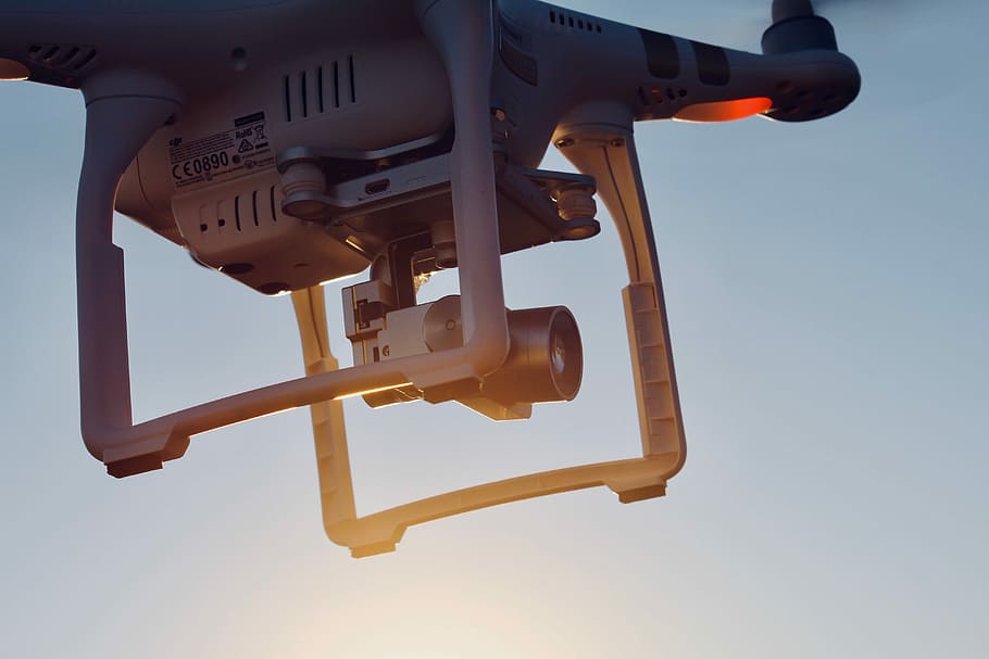 closeup photo of DJI Phantom 3, gray quadcopter drone photo at daytime HD wallpaper