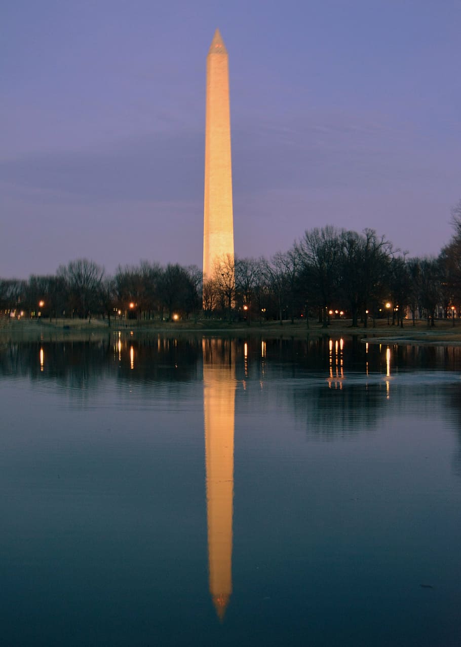 brown concrete tower near body of water during nighttime, washington HD wallpaper