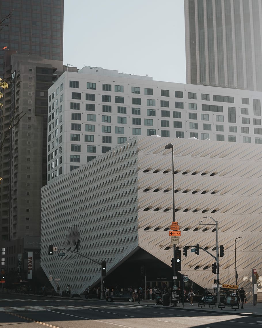 grey and white buildings near road, white concrete building during daytime HD wallpaper