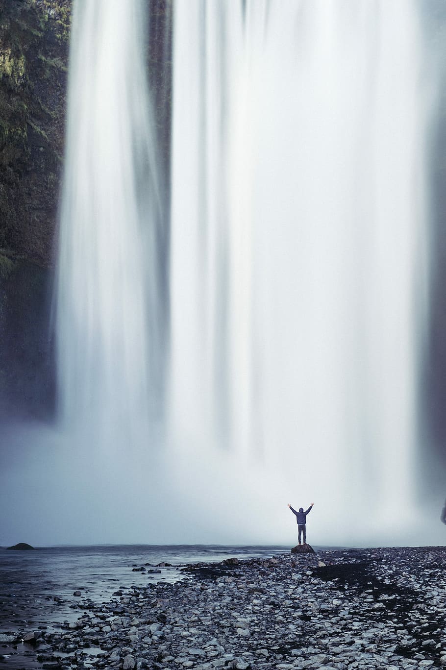 person standing beside waterfall, person stand in front of waterfalls HD wallpaper