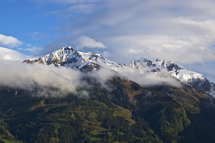 snow capped mountain during white and blue clouds, aerial photography of mountain range covered with snow HD wallpaper