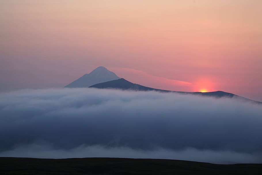 mountain covered with clouds, volcano, sunset, evening, mountains HD wallpaper