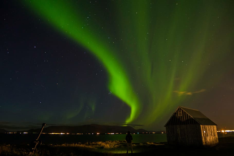 brown wooden house, male, standing, watching, aurora, near, space, HD wallpaper