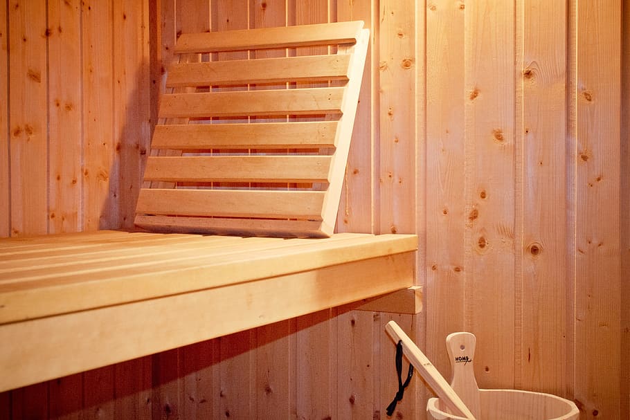 beige wooden sauna room, wooden bench, wood sauna, finnish sauna