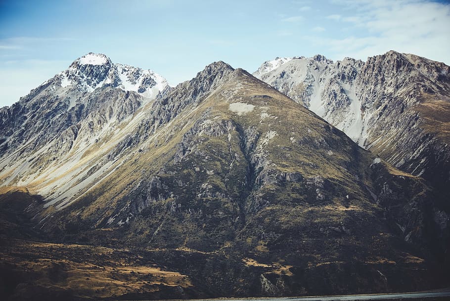 brown rocky mountain with icy caps during day, highland, cloud HD wallpaper