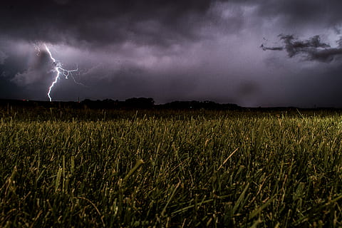 grass field under cloudy sky, thunder strike green grass field HD wallpaper