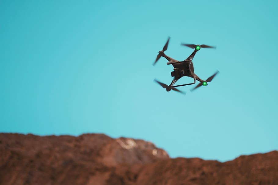 hovering black drone, black and green drone on air, sky, blue HD wallpaper