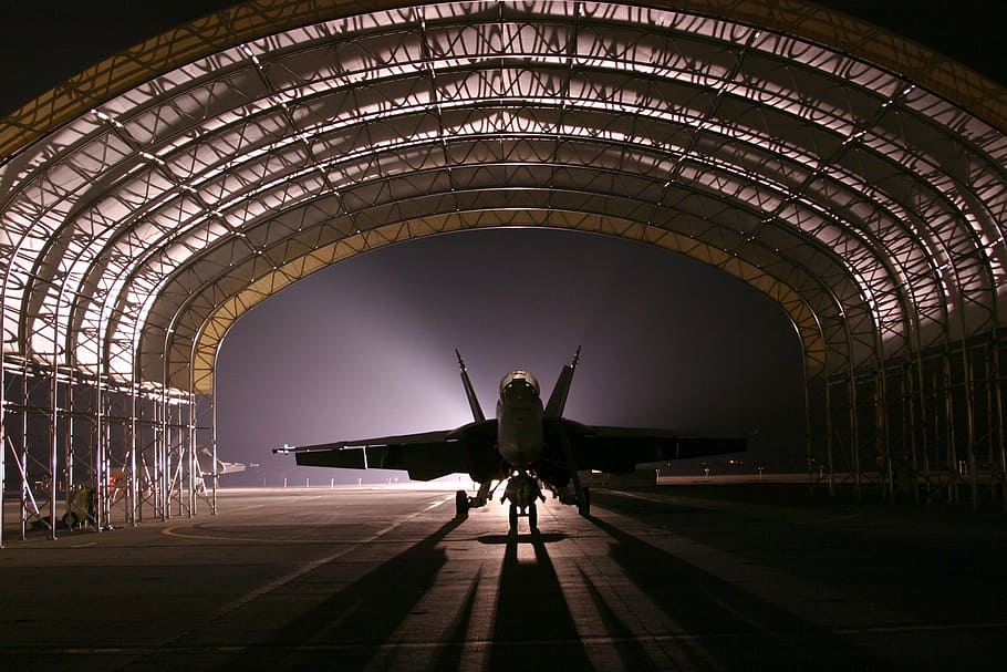 silhouette of jet during night time, hangar, aircraft, fighter