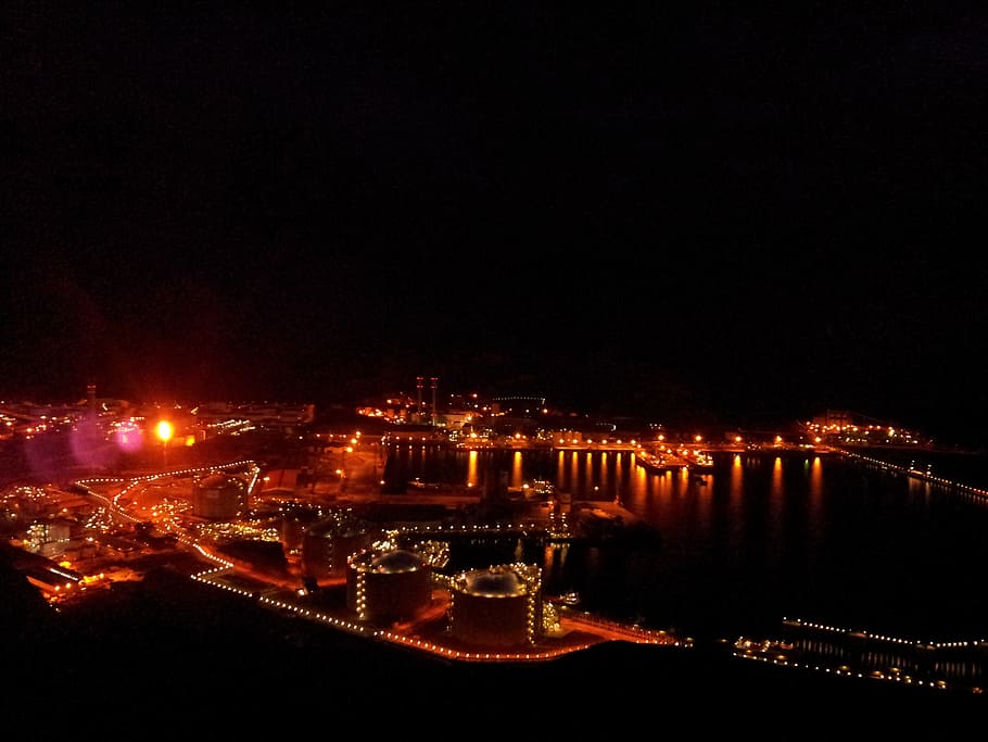 night, lights, refinery, fire, flame, city, sea, reflection HD wallpaper