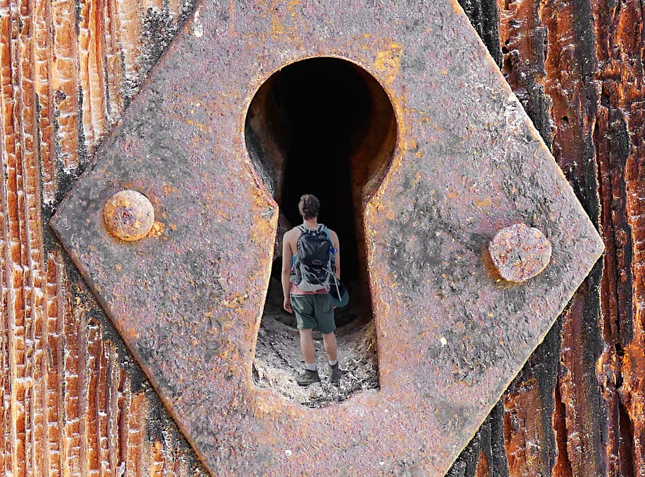 man standing inside the keyhole, exploration, adventure, lock HD wallpaper