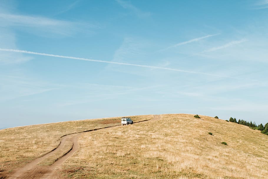 white vehicle on brown hill, white car on brown grass field under clear blue sky, HD wallpaper