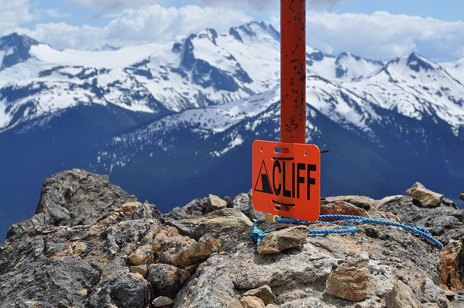 mountains, cliff, adventure, view, risk, challenge, sign, cold temperature HD wallpaper