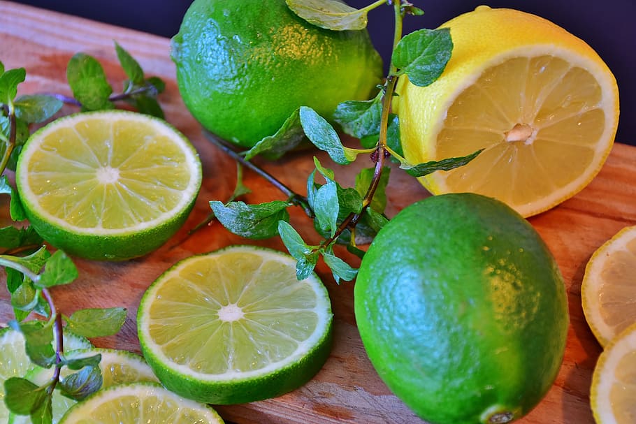 bunch of lemons on brown surface, Lime, Citrus, Fruit, Sour HD wallpaper