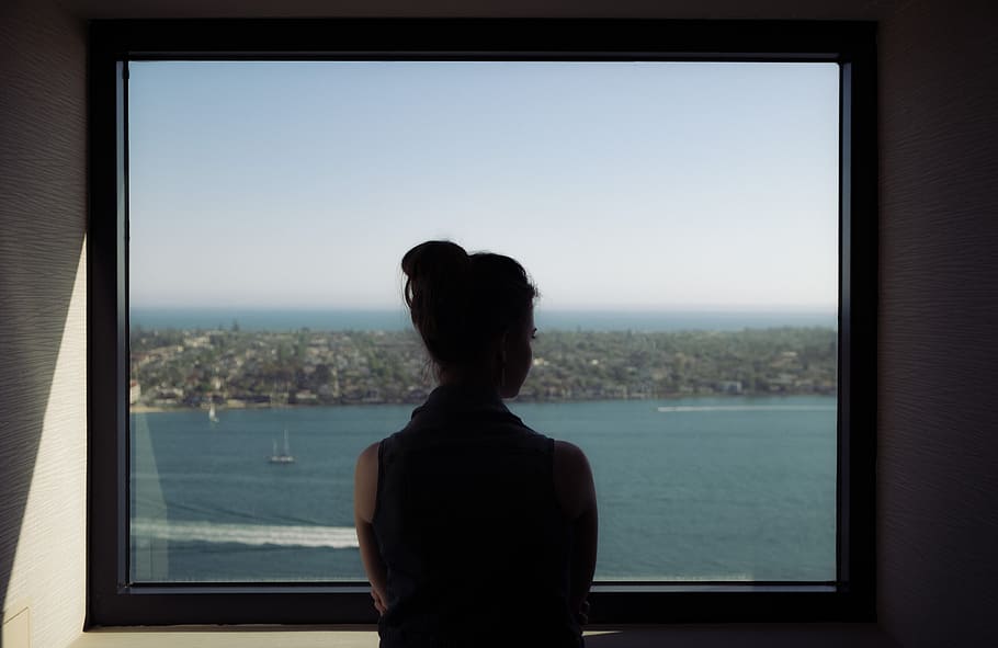 woman wearing off-shoulder shirt standing beside window, woman facing glass window, HD wallpaper