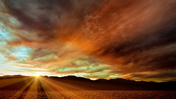 sun rays from silhouette of mountain during cloudy day, sunset HD wallpaper