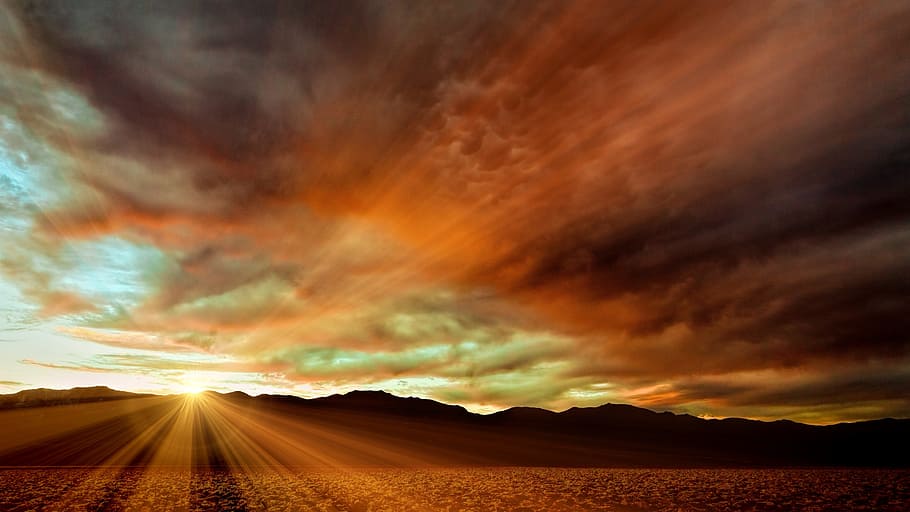 sun rays from silhouette of mountain during cloudy day, sunset HD wallpaper