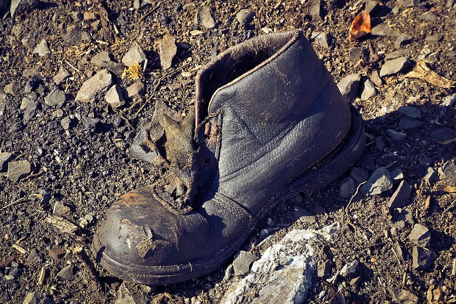 close-up photo of black leather work boot, garbage, debris HD wallpaper