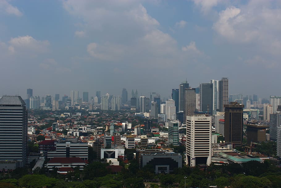aerial photo of cityscape at daytime, jakarta, smog, architecture