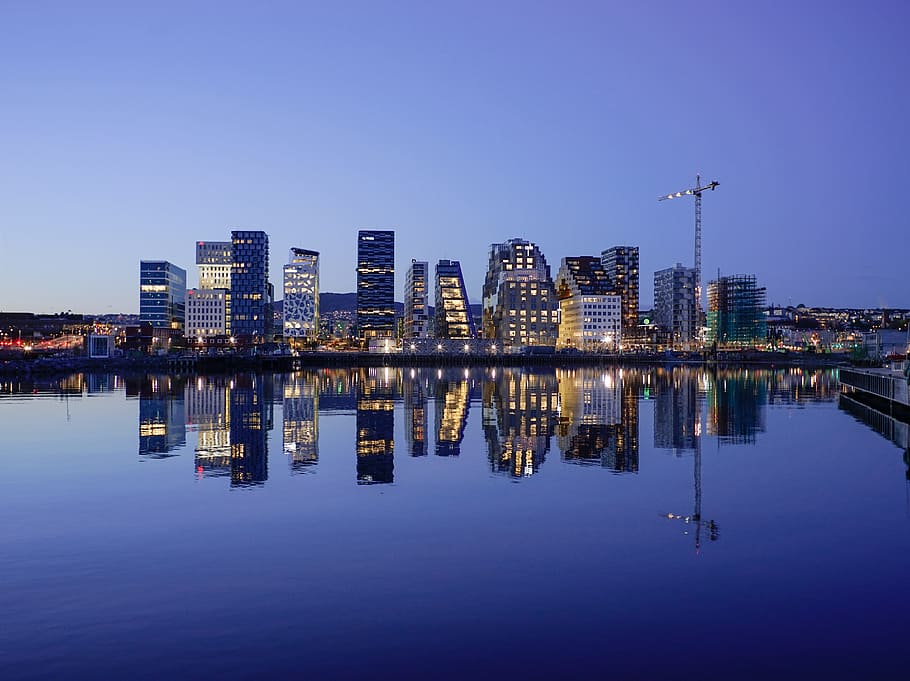 city skyline during nighttime, cityscape, reflection, glassy HD wallpaper