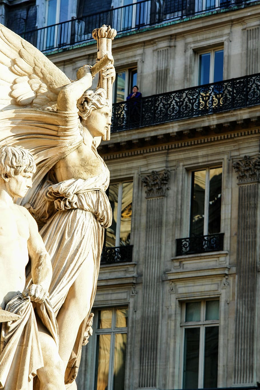 brown angel statue beside of building during daytime, paris, facade