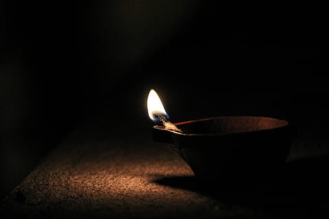 Absence of Darkness, brown candle on brown holder, match, flame HD wallpaper