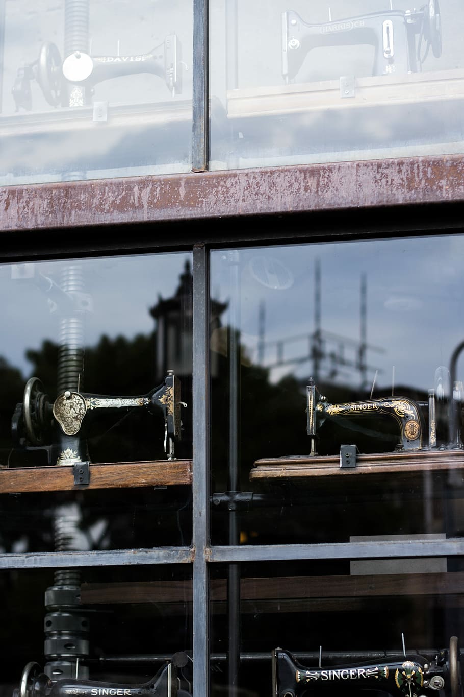 several sewing machine near glass window, untitled, singer sewing machine HD wallpaper