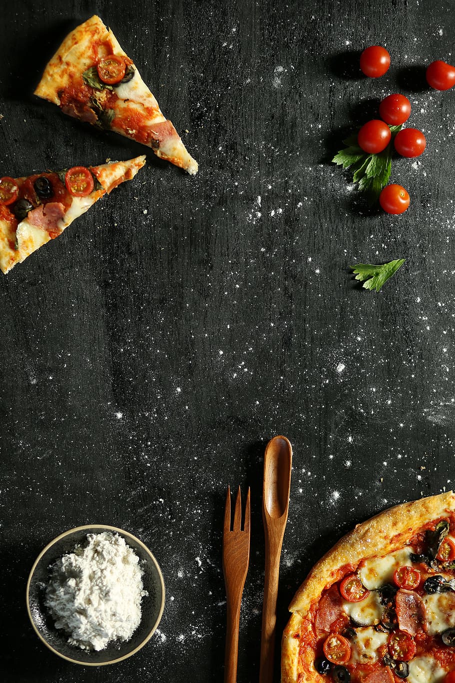 two slice of pizza near tomatoes and spoon, pizza hut, cooking