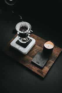 coffee making process, black candle holder on brown wooden board HD wallpaper
