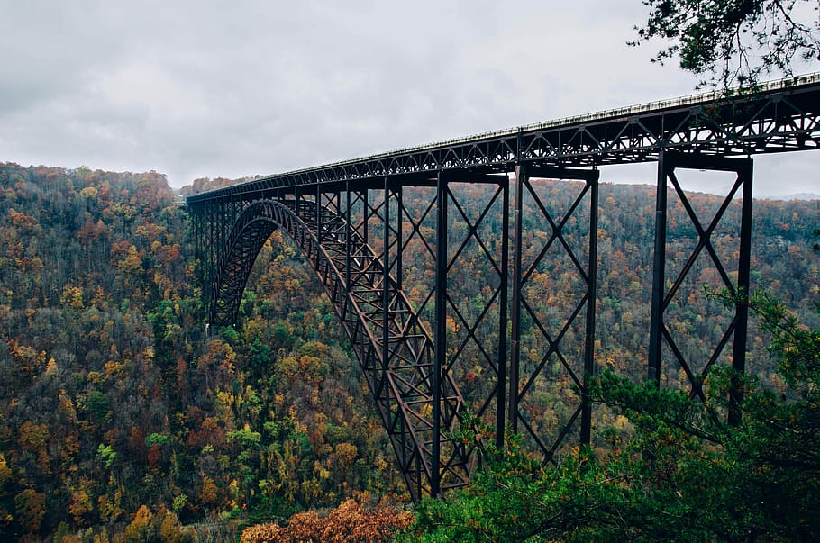 brown train rail, black metal train bridges taken at daytime HD wallpaper