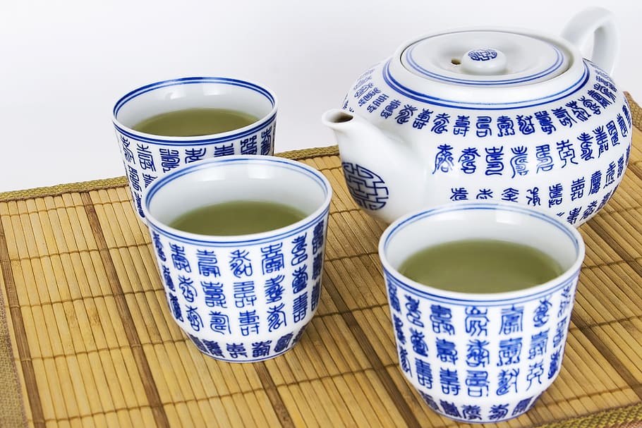 white-and-blue ceramic tea set, traditional, green, maker, glazed