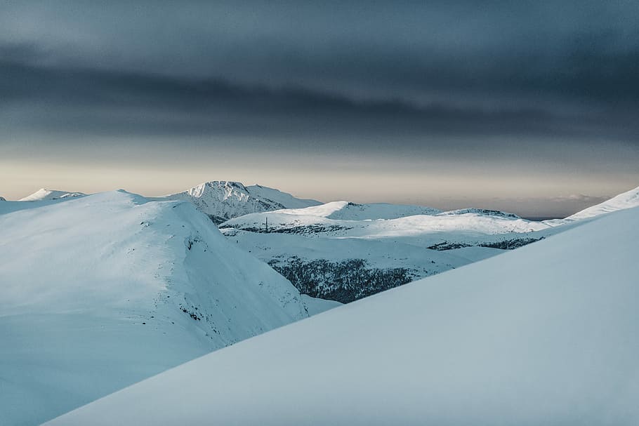 snow covered mountains, snow capped mountains under gray clouds HD wallpaper